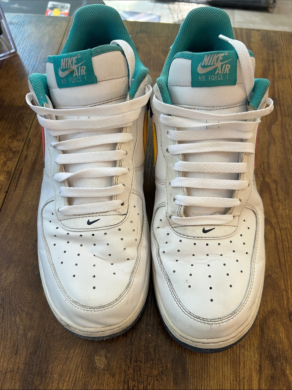 Nike Men’s White Sneakers with Teal and Yellow Accents